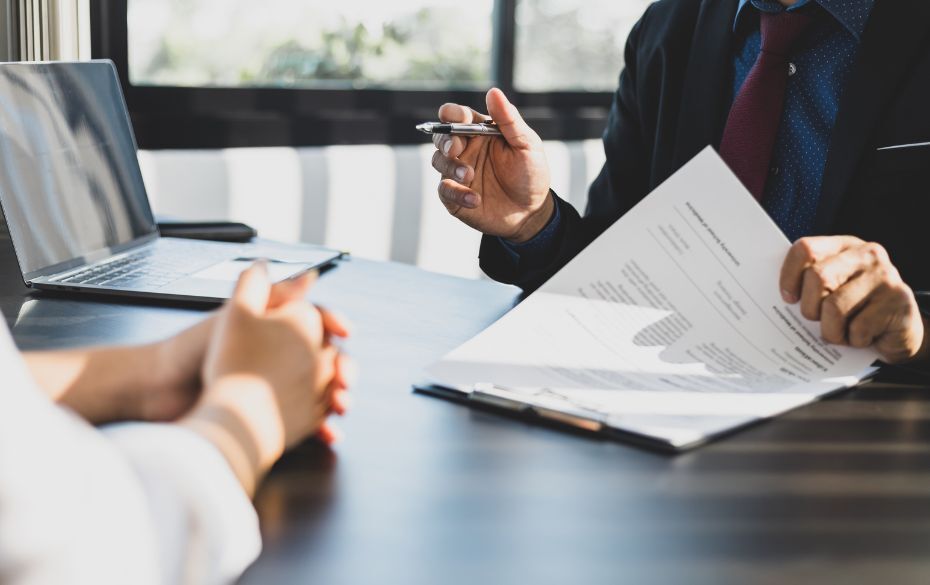 Businesspeople discussing a contract